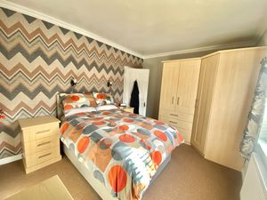 Bedroom One- click for photo gallery